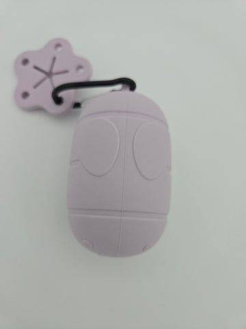 Pink silicone dog poop bag dispenser with carabiner clip and paw charm includes compostable 15 bag roll and 99% recycled 15 bag roll - thumbnail