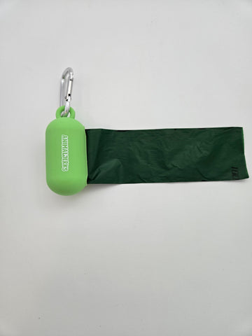 Green portable food grade silicone dog waste bag dispenser with clip comes with compostable and recycled rolls, shows bag pulled out - thumbnail