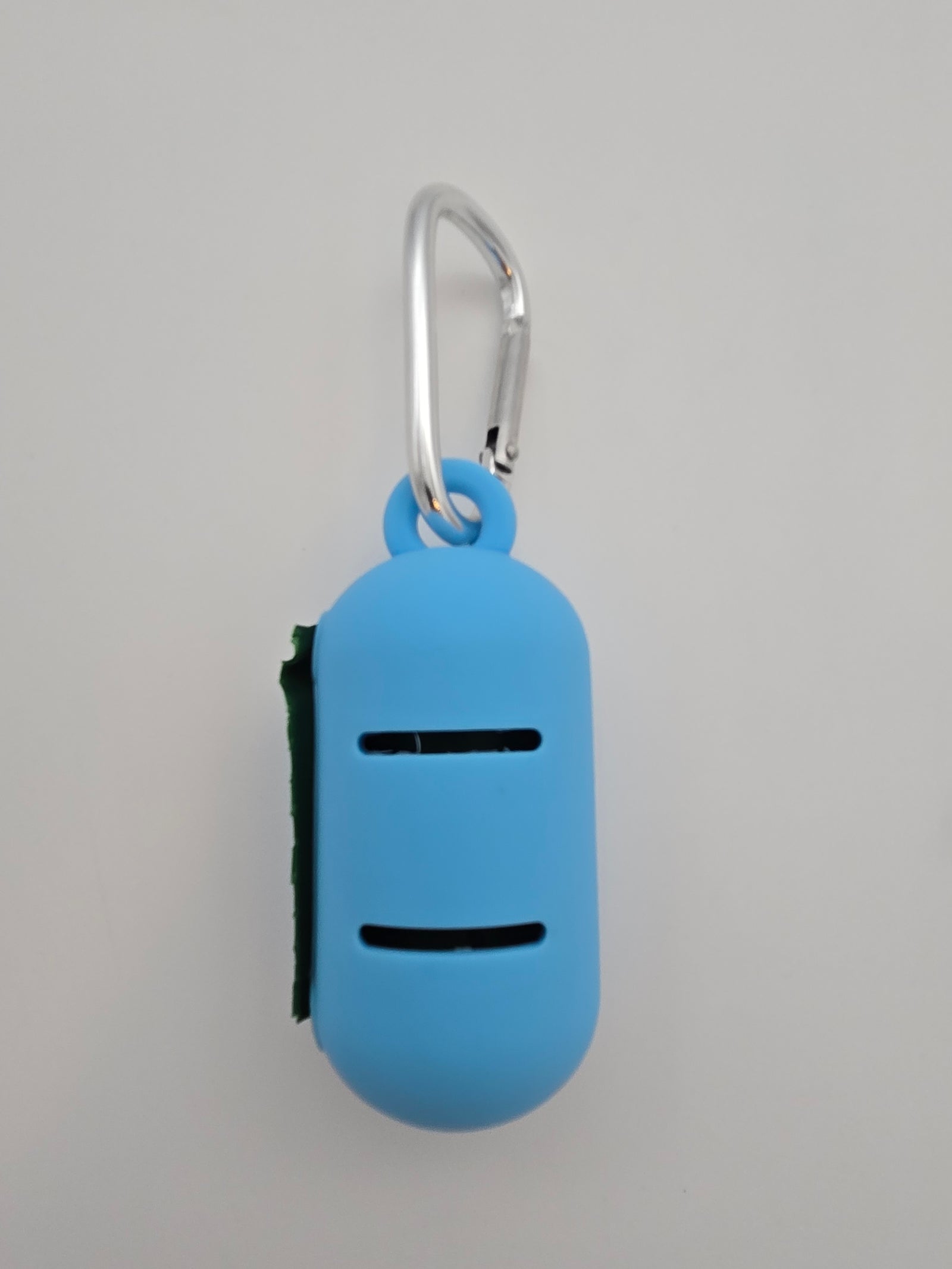 Blue portable food grade silicone dog waste bag dispenser with clip comes with compostable and recycled rolls, shows leash slot - alternate view