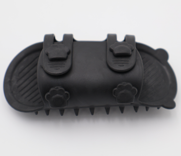 Black silicone cat grooming scratcher, underneath showing the two sizes if it was attached to a table leg.  - thumbnail
