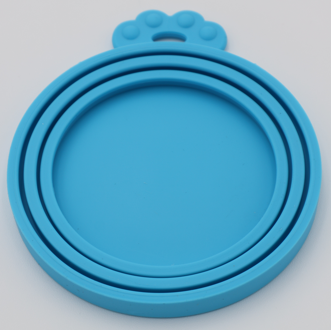 Blue food-grade silicone lids for pet food cans airtight flexible universal fit, underneath view
