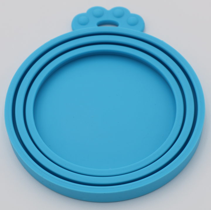 Blue food-grade silicone lids for pet food cans airtight flexible universal fit, underneath view