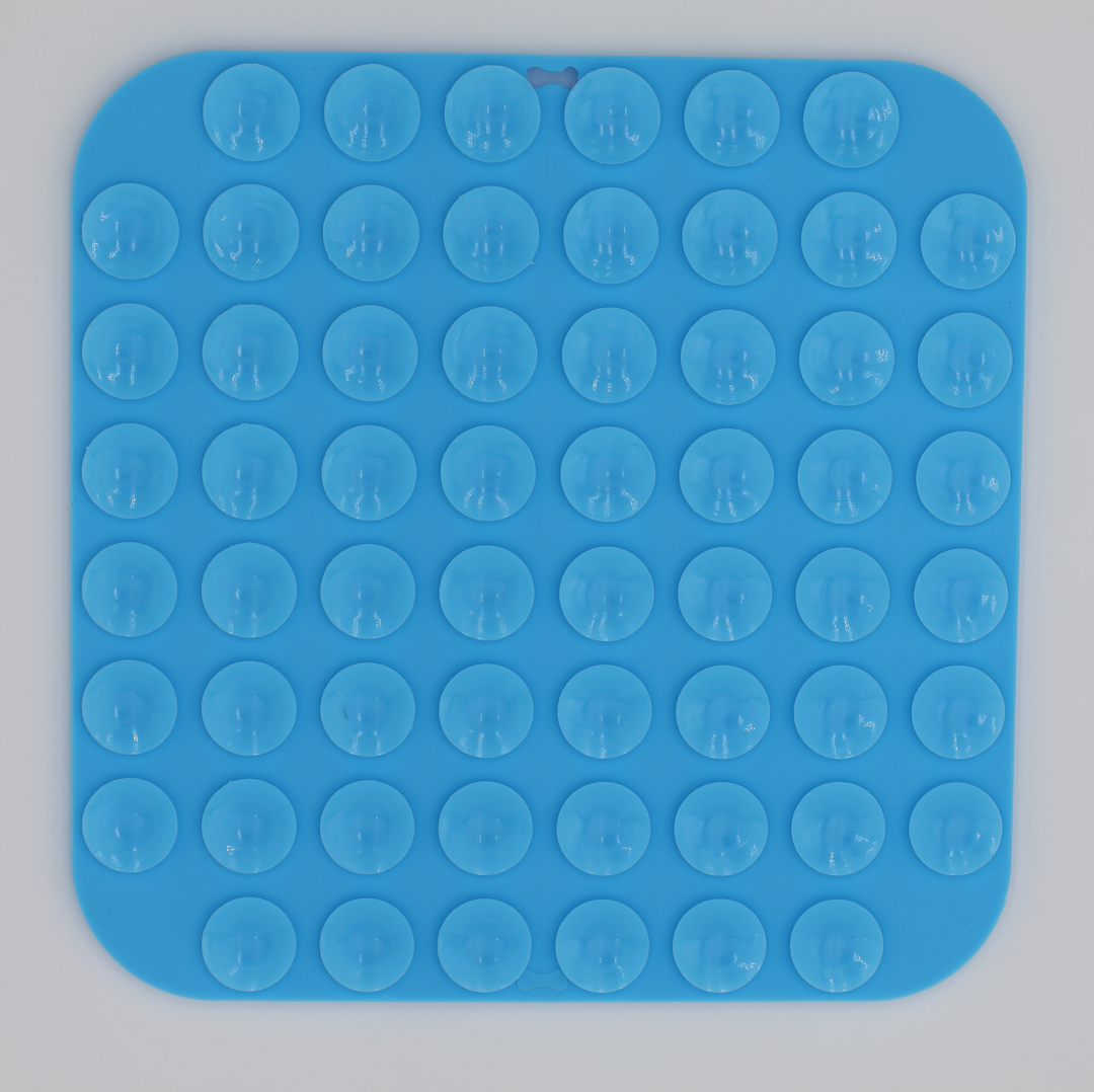 Blue food grade silicone dog licking mat underneath suction cups