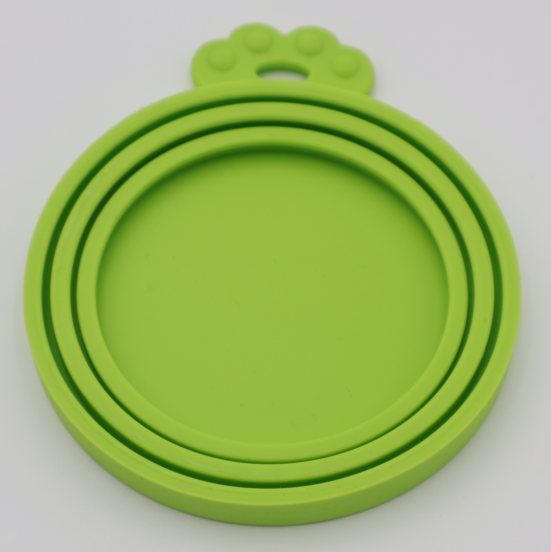Green food-grade silicone lids for pet food cans airtight flexible universal fit, underneath view