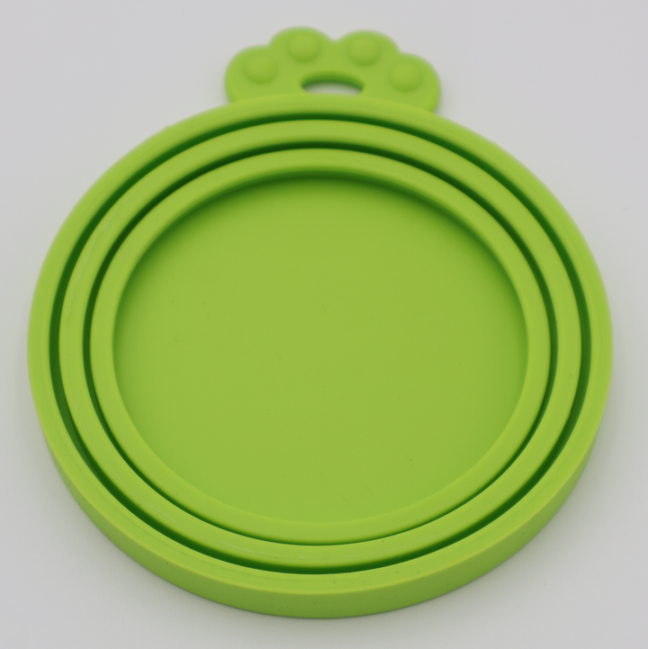Green food-grade silicone lids for pet food cans airtight flexible universal fit, underneath view