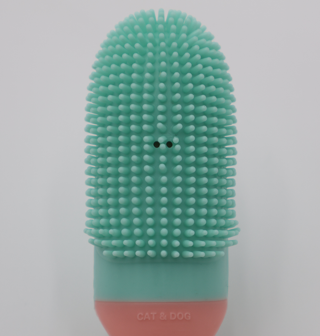 Silicone pet toothbrush head with soft cleaning mint green bristles for gentle dental care