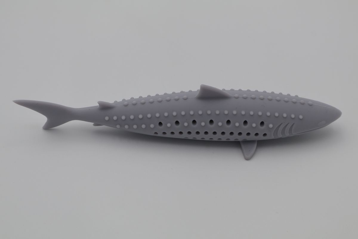 Grey durable food grade silicone shark toy for cats hollow center for catnip dishwasher safe, side view