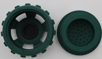 Open large green dog treat ball dispenser, two-piece design for frozen treats - thumbnail