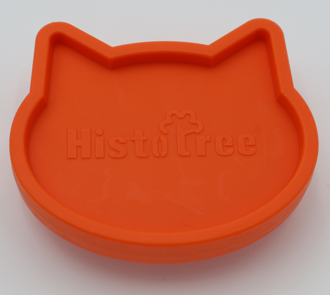 Orange soft silicone pet bath brush ergonomic grip for wet and dry grooming dogs cats, top view