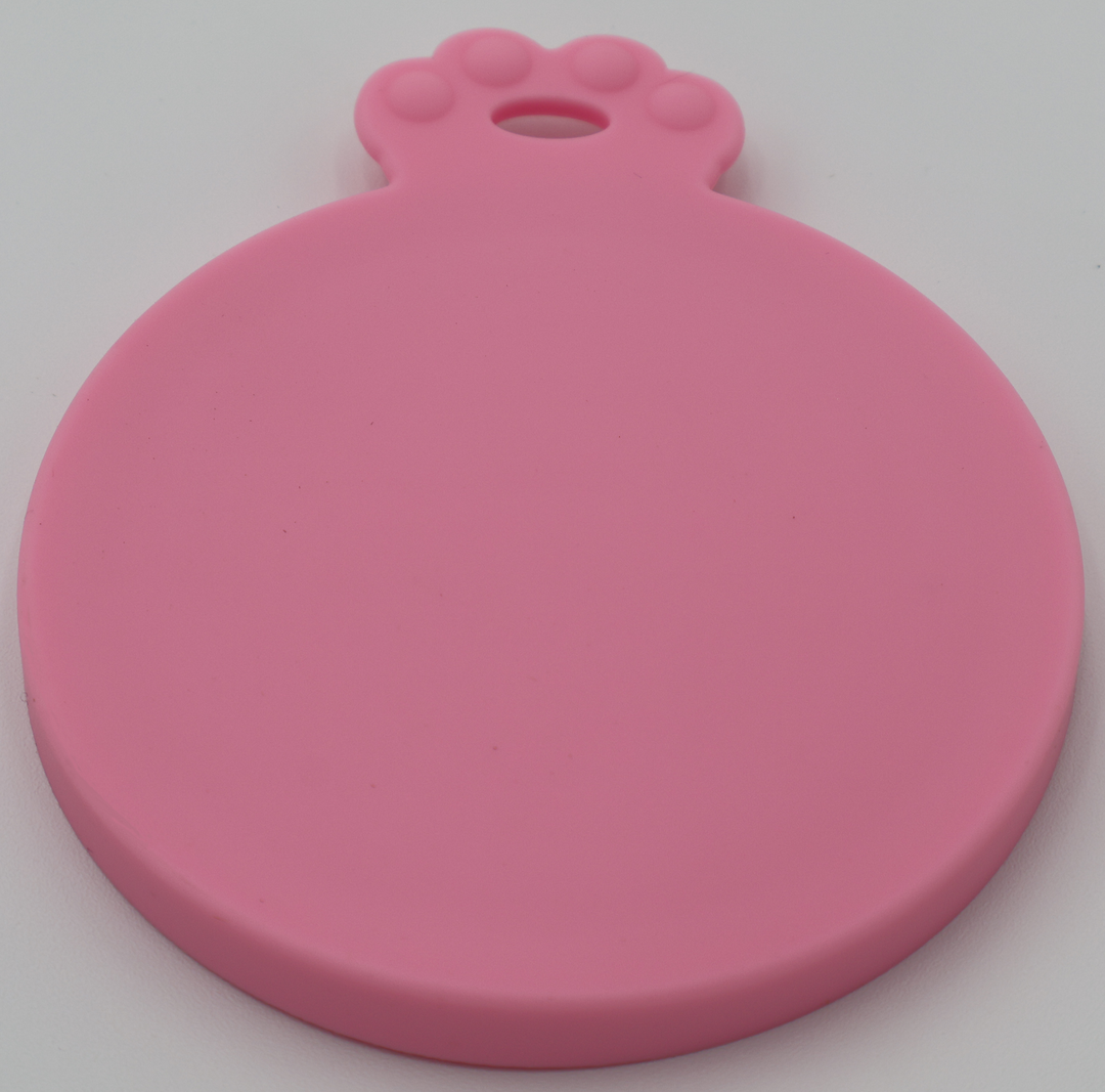 Pink food-grade silicone lids for pet food cans airtight flexible universal fit, top view