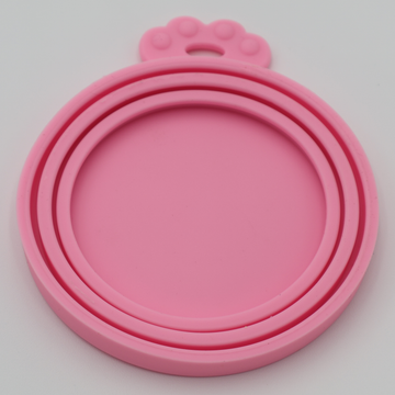 Pink food-grade silicone lids for pet food cans airtight flexible universal fit, underneath view - thumbnail