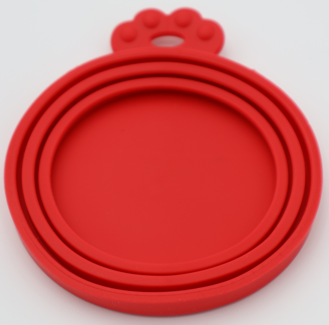 Red food-grade silicone lids for pet food cans airtight flexible universal fit, underneath view