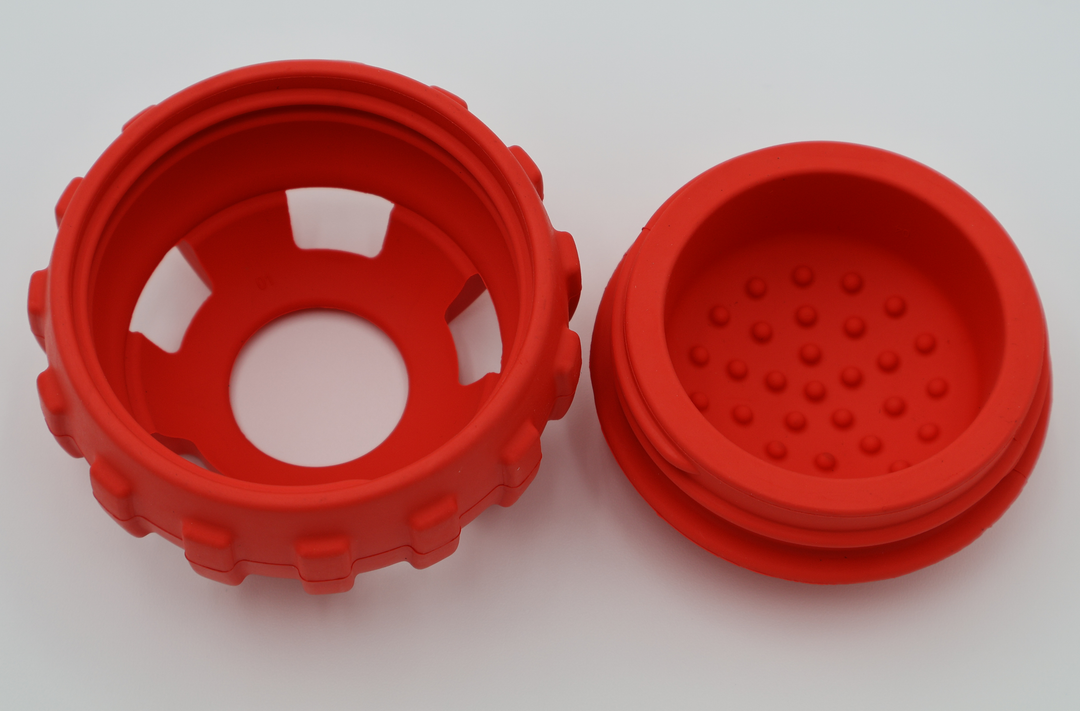 Open small red dog treat ball dispenser, two-piece design for frozen treats