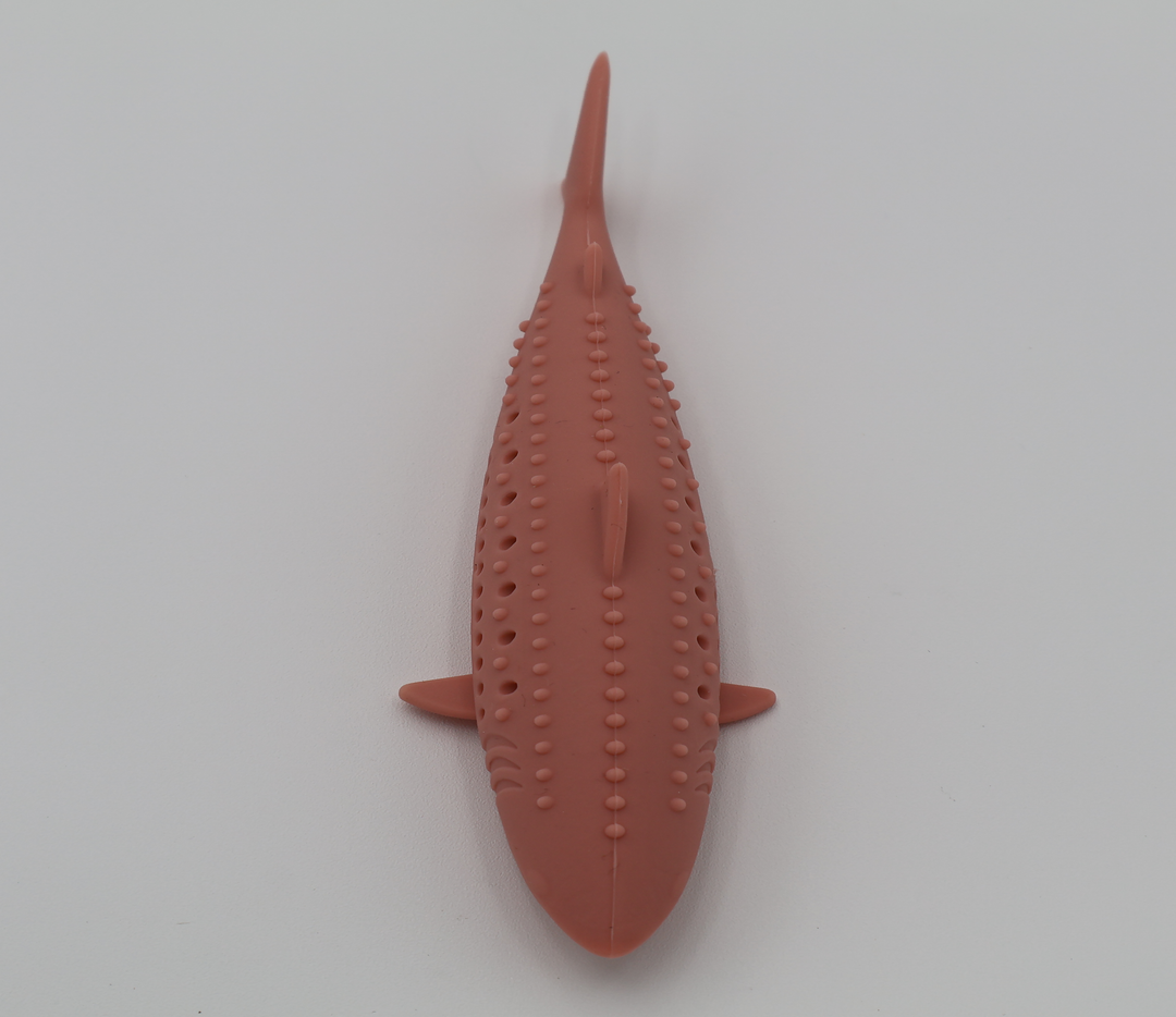 Coral pink durable food grade silicone shark toy for cats hollow center for catnip dishwasher safe, top view